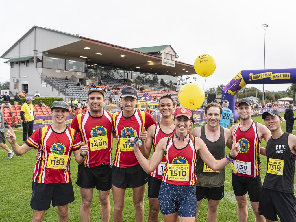 Melanie Magarey, the first female to finish the half marathon of the Toowoomba Marathon event, celebrates with other runners, Sunday, May 5, 2024. Picture: Kevin Farmer
