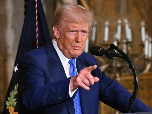 TOPSHOT - US President Donald Trump speaks during signing of executive orders at his Mar-a-Lago resort in Palm Beach, Florida, on February 18, 2025. (Photo by ROBERTO SCHMIDT / AFP)