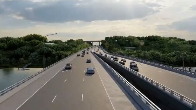 The project will create six lanes spread across one new bridge and the existing Centenary Bridge. Pictured looking north.