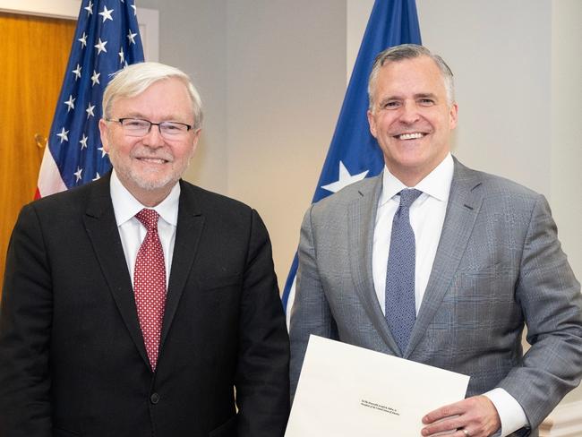 Kevin Rudd hands his credentials to US Chief of Protocol Rufus Gifford. Picture: Twitter