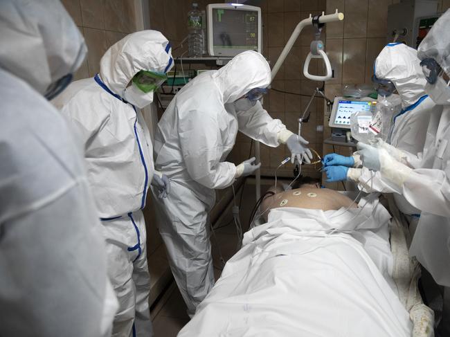 Russian doctors treat a coronavirus patient on a ventilator at an intensive care unit of the Filatov City Clinical Hospital in Moscow. Picture: AP.