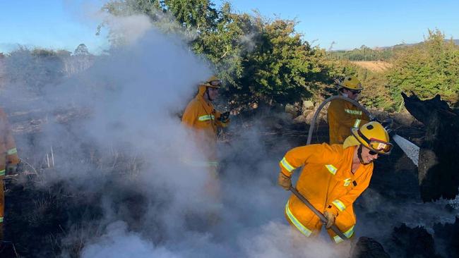 CFA firefighters battled a fast-moving grass fire on the Calder Freeway at Kyneton on January 18. Picture: Woodend CFA.