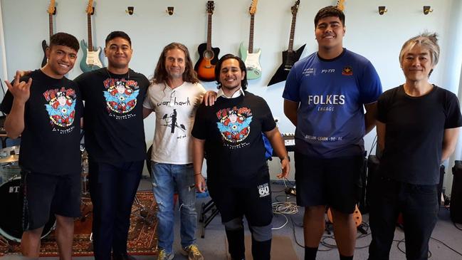 Hard-Ons members Peter 'Blackie' Black and Ray Ahn meeting Punchbowl Boys High School YouthRock band winners '320'. Picture: Facebook