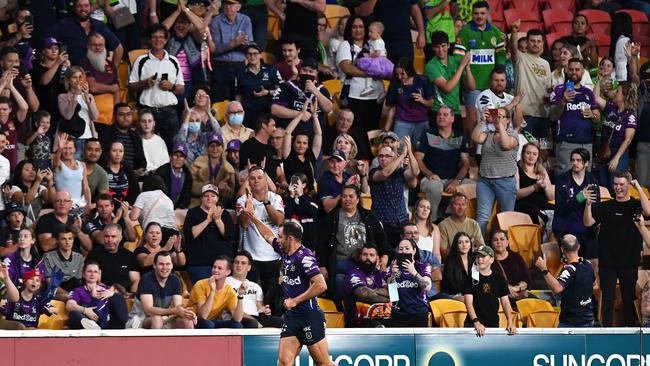 The Suncorp Stadium crowd applaud Cameron Smith.