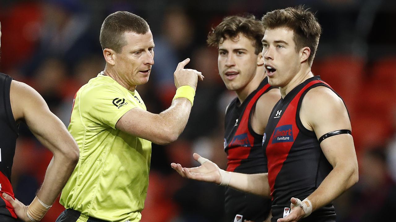 Essendon star Zach Merrett is shocked by a free against.