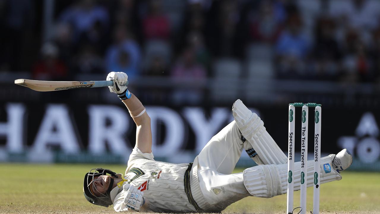 Steve Smith falls to the ground while attempting to play at a delivery from his nemesis Jofra Archer. Picture: Ryan Pierse/Getty Images.