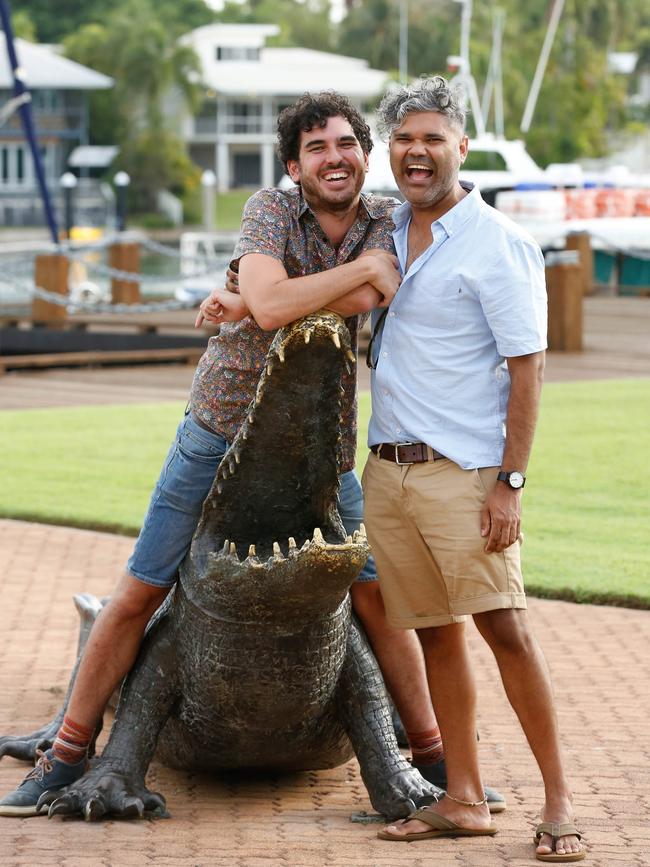 Mitch Dyson, left, from Melbourne, and his partner Desmond Campbell, fled Victorian for the sunny climes of Darwin amid the coronavirus pandemic because of the Northern Territory's relative safety. Picture: Glenn Campbell