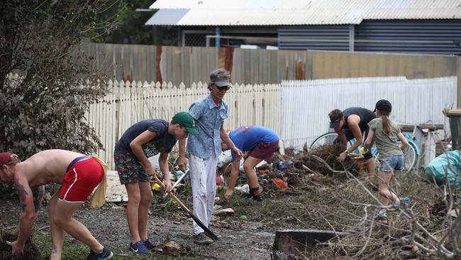 Cleaning up in Vincent St, Auchenflower. Picture: Annette Dew