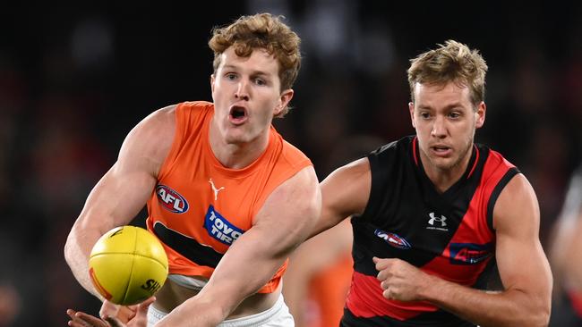 Giant Tom Green and Bomber Darcy Parish go head to head. Picture: Quinn Rooney/Getty Images