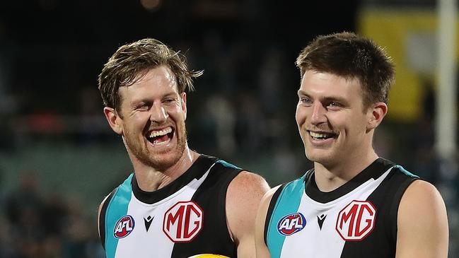 Tom Jonas with Dylan Williams who re-signed last week. Picture: Sarah Reed/AFL Photos via Getty Images