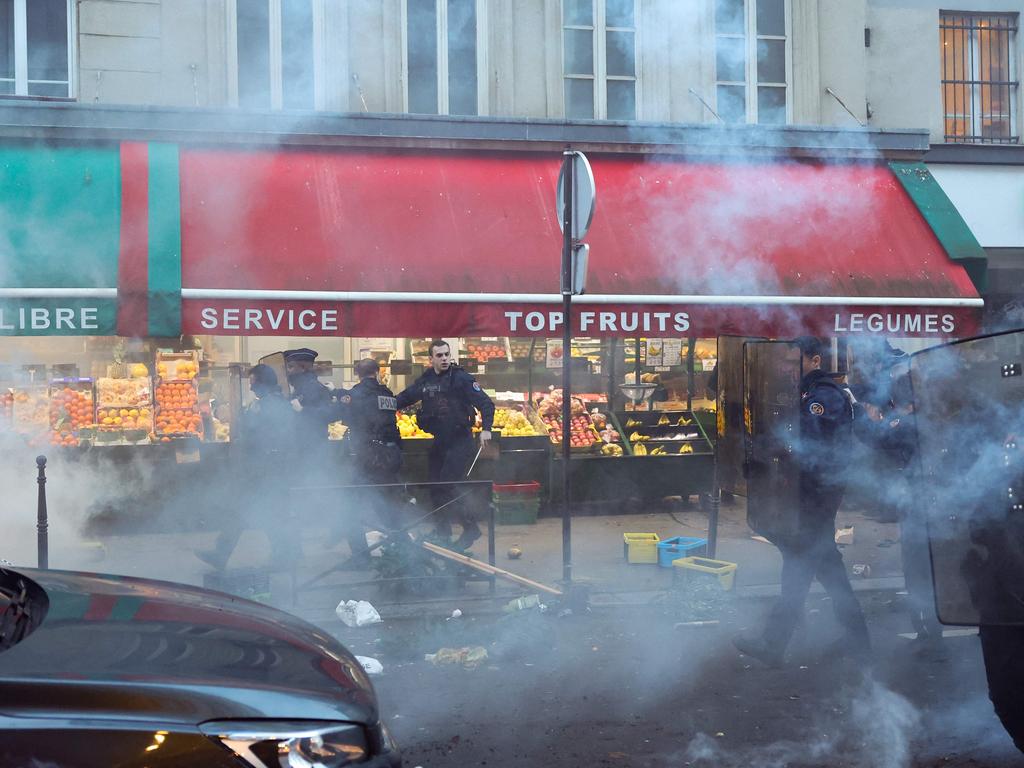 Barricades were set on fire during the riot. Picture: AFP