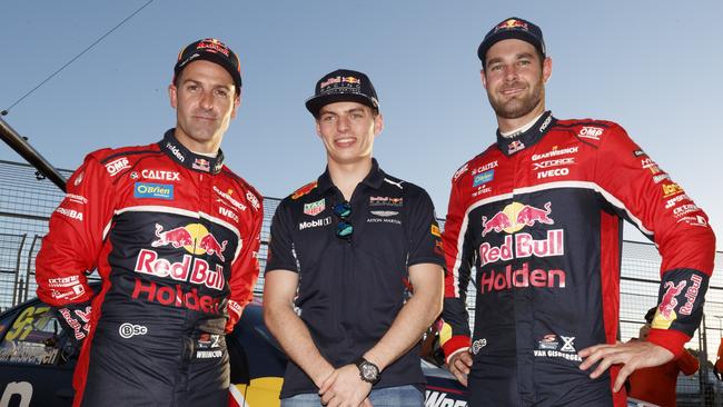 Shane van Gisbergen and Jamie Whincup of Red Bull Holden Racing Team with Verstappen.