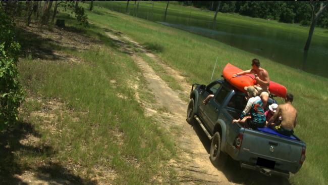 Passengers illegally riding in a ute at Danbulla State Forest. Dozens of vehicle owners who illegally entered the national park and allegedly caused damage have been caught by Queensland Parks and Wildlife Service. Picture: QPWS