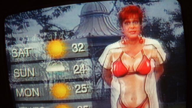 1997: Wills wearing a bikini t-shirt while presenting her last weather report on Channel 7.