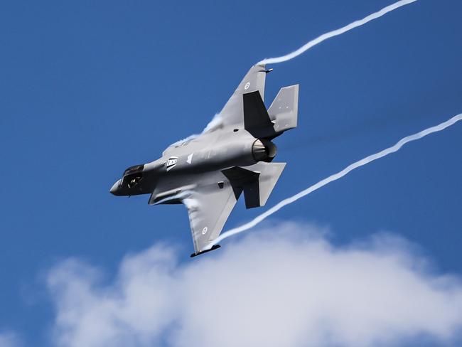 SYDNEY, AUSTRALIA - NewsWire Photos JANUARY 26, 2022: Australia Day Ferrython on Sydney Harbour. A RAAF F-35A Lightnight II jet puts on a display above Sydney Harbour. Picture: NCA NewsWire/Dylan Robinson