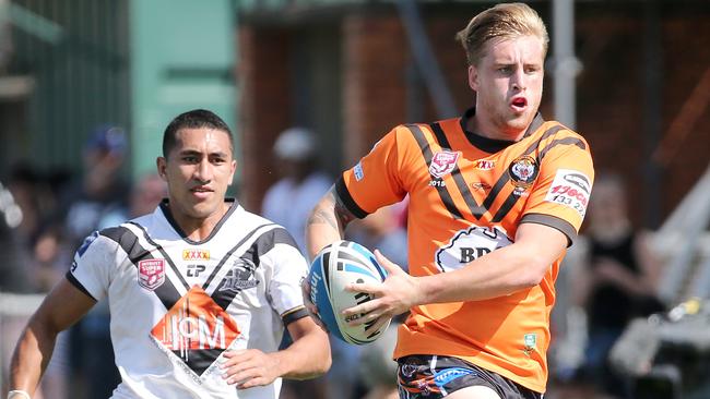 Cameron Munster makes a break for Easts. Picture: Jono Searle