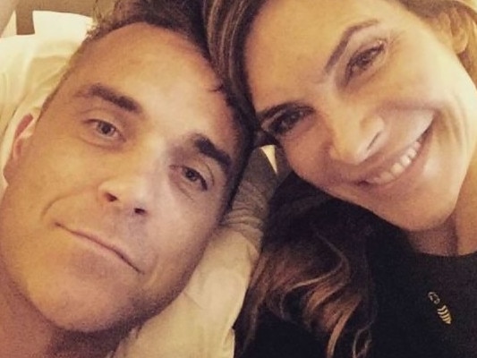 Robbie Williams'swife Ayda shares photo of singer naked in bed