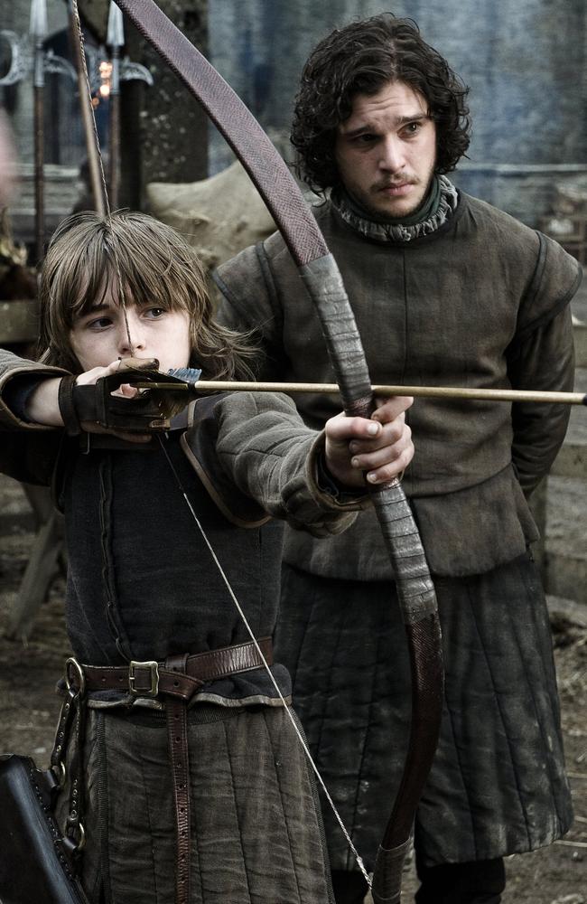 Aiming up ... Jon Snow (Kit Harrington) mentors young Bran Stark (Isaac Hempsted Wright) in a scene from season one of HBO/Foxtel drama, Game Of Thrones. Picture: HBO 