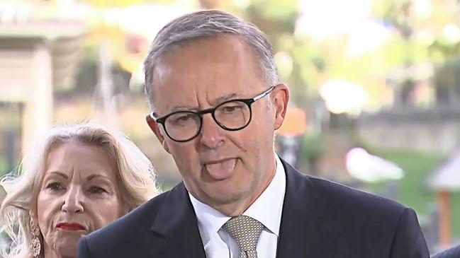 Anthony Albanese sticks out his tongue as he stumbles on the current unemployment rate in Launceston on Monday. Picture: Sky News