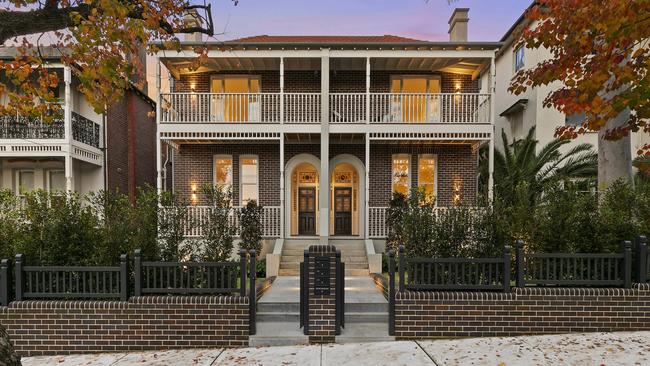 One Neutral Bay townhouse sold for $4.85m last year and another is being auctioned with a price guide of $5.3m.