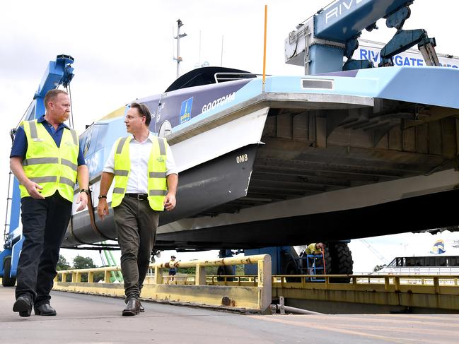 CityCats being lifted out of the Brisbane River ahead of Cyclone Alfred’s arrival. Picture: John Gass