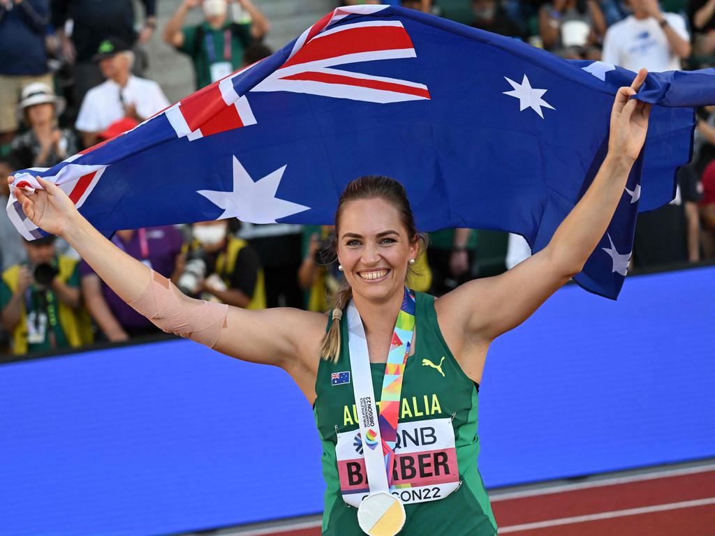 Australia's Kelsey-Lee Barber celebrates with her medal after winning the women's javelin throw final during the World Athletics Championships. Picture: Andrej Isakovic/AFP