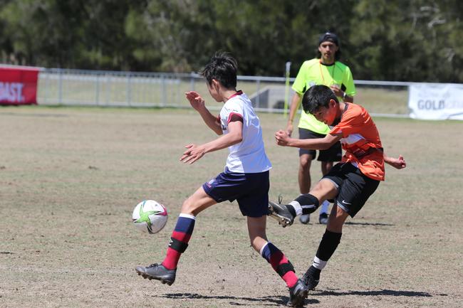 The Premier Invitational football tournament on the Gold Coast. TSS v Logan under-13s in action. Picture: Mike Batterham.