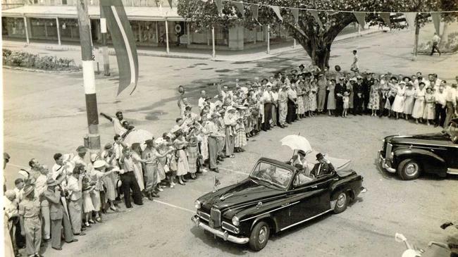 Queen Elizabeth and Prince Phillip travelling through the Sydney Street and Victoria Street intersection in 1954.