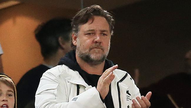 Russell Crowe cheers on Souths.
