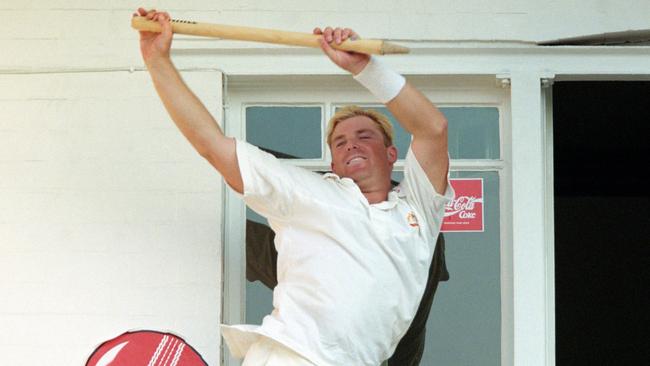 Warne’s victory dancing with a stump on the dressing room balcony.