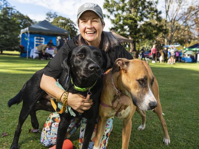 Jessica Bohan with Korra (left) and Coby before Toowoomba's Million Paws Walk at Queens Park, Friday, May 24, 2024. Picture: Kevin Farmer