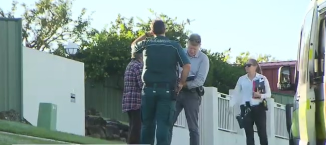 Detective and paramedics at the Helensvale crime scene in May. Picture: 9News