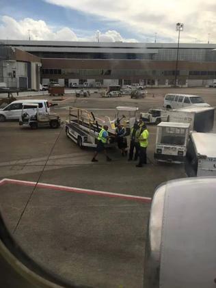 Commotion on the tarmac after the incident. Picture: Facebook/Cathy Cole