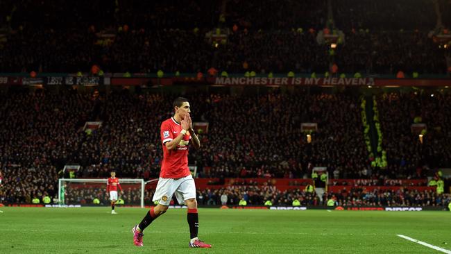 A dejected Angel di Maria of Manchester United walks off the pitch after receiving the red card from referee Michael Oliver during the FA Cup Quarter Final match between Manchester United and Arsenal at Old Trafford.