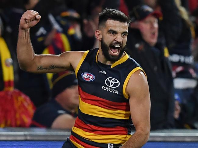 ADELAIDE, AUSTRALIA - JULY 30: Wayne Milera of the Crows celebrates a goal reviewed to be touched during the round 20 AFL match between the Adelaide Crows and the Carlton Blues at Adelaide Oval on July 30, 2022 in Adelaide, Australia. (Photo by Mark Brake/Getty Images)