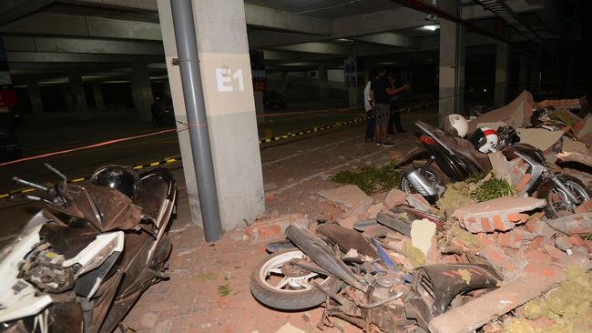 Bikes and debris at a damaged shopping mall in Bali's capital Denpasar. Picture: AFP.