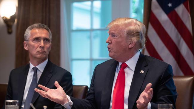 Donald Trump speaks during a meeting with NATO Secretary General Jens Stoltenberg, left, in 2018. Picture: AFP