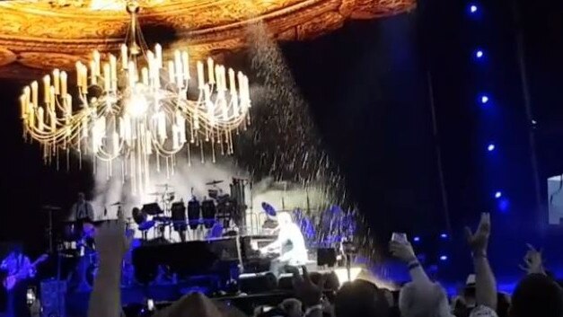 Elton John getting soaked at Yarra Valley on January 31. Pic: Instagram/@himuratz