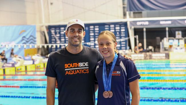 Bailey Day and her head coach Lachlan Staples.