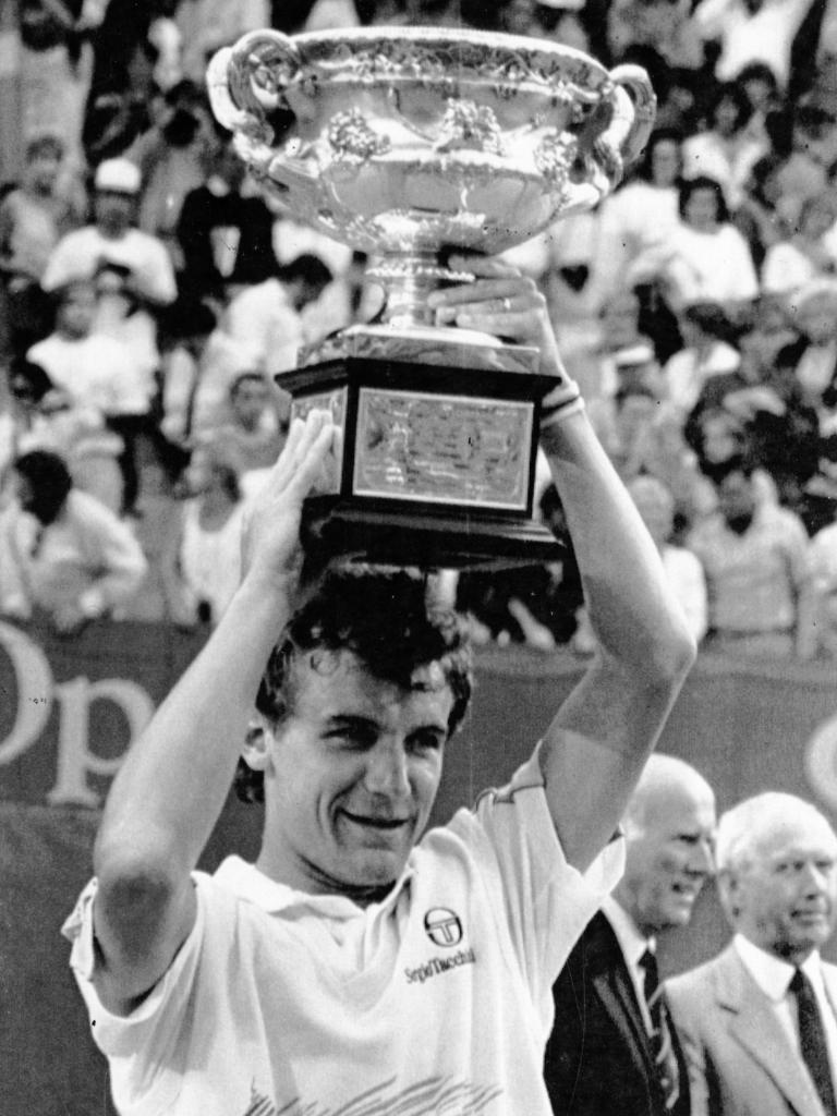 Australian Open tennis tournament men’s singles winner Mats Wilander of Sweden, holding his trophy aloft after defeating Australia’s Pat Cash in five sets, 24 Jan 1988.