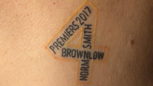 Dusty’s nanna Lois Knight shows off her premiership tattoo.