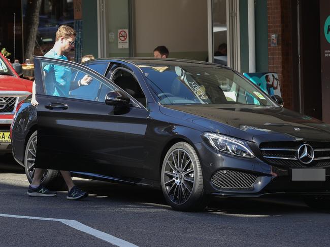 Smith gets out of a black Mercedes as he headed to a meeting. Picture: MEGA