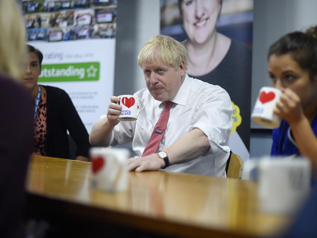 British Prime Minister Boris Johnson speaks to mental health professionals at abhospital in Watford, as the Brexit chaos continued to swirl around him. Picture: Getty Images