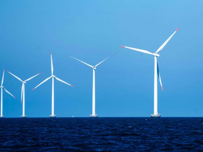 Picture taken on September 4, 2023 shows windmills at the Nysted Offshore Wind Farm constructed by Danish windpower giant Orsted in 2002-2003 in the Baltic Sea near Gedser in Denmark. Long dependent on fossil fuels before emerging a champion of offshore wind power, Danish company Orsted is now struggling to restore its business after a year that saw it drop several major projects. The cancellation of a huge offshore wind farm project in the United States at the end of 2023, accompanied by nearly $4 billion in write-downs, have spotlighted the challenges faced by the Danish group as it seeks to transform. (Photo by Thomas Traasdahl / Ritzau Scanpix / AFP) / Denmark OUT