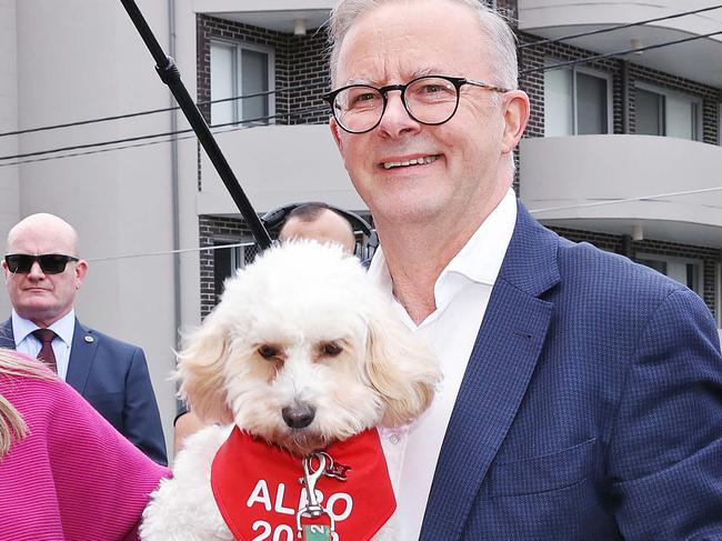 FEDERAL ELECTION TEAM 2022. LABOR BUS TOUR 21/5/22Federal Labor leader Anthony Albanese arrives at Marrickville Library in the seat of Barton with partner Jodie Haydon,  son Nathan and dog Toto to cast his vote on Election Day.   Anthony  addresses media for the last time until tonight. Picture: Sam Ruttyn