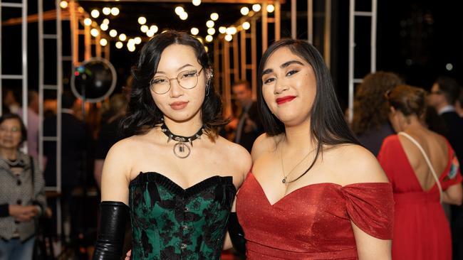 Alice Li and Jemima Vaurasi at the year 12 St Hilda formal. Photo: Celeste Humphrey