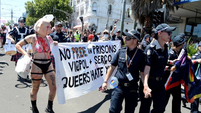 A group of protesters clash with police who were marching in the Midsumma Pride Parade. Picture: Andrew Henshaw