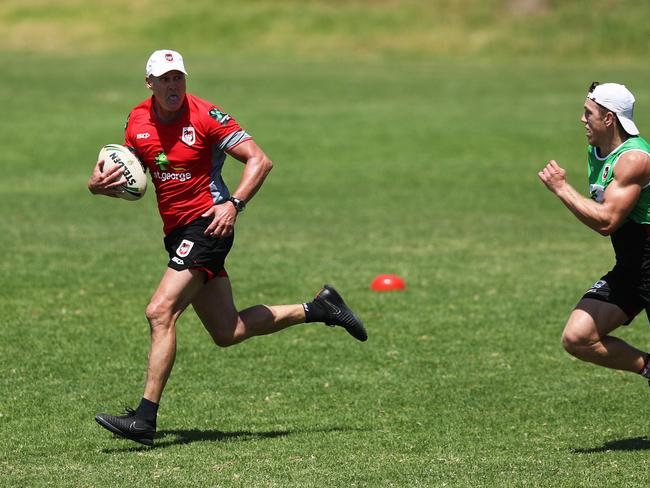 Coach Paul McGregor sprints away during a St George Illawarra training session at WIN Stadium. Picture: Brett Costello