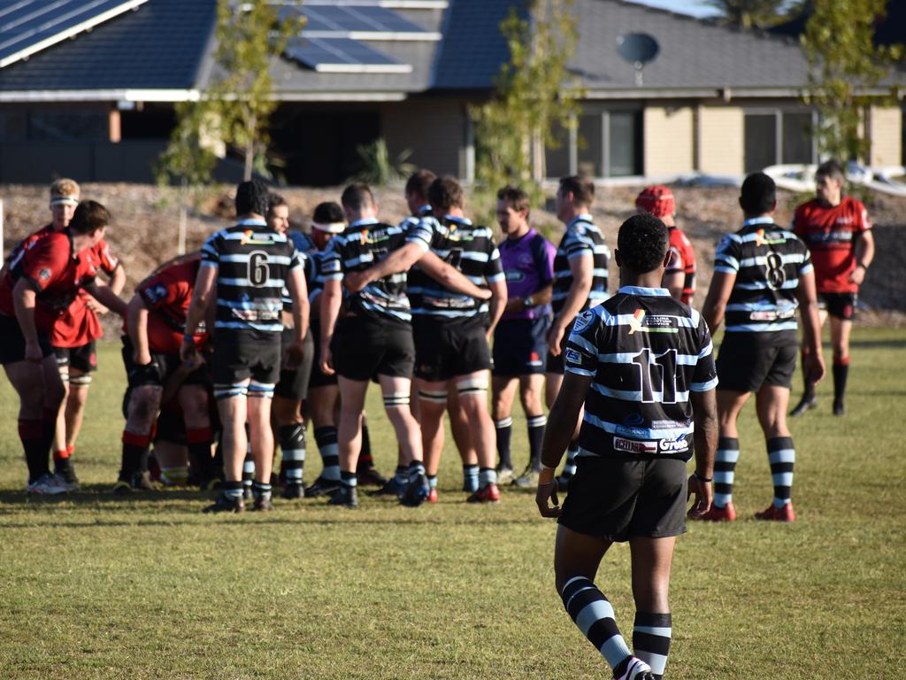 Samisoi Yamai watches on as the scrum is set