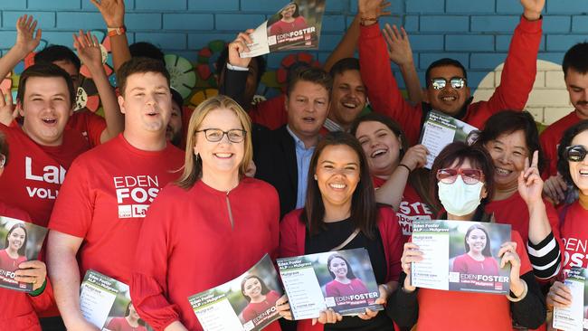 (L-R) Victorian Premier Jacinta Allan handing out how to vote cards with Deputy Premier Ben Carroll (middle) and Labor candidate Eden Foster at Mulgrave Primary School. Picture: Josie Hayden